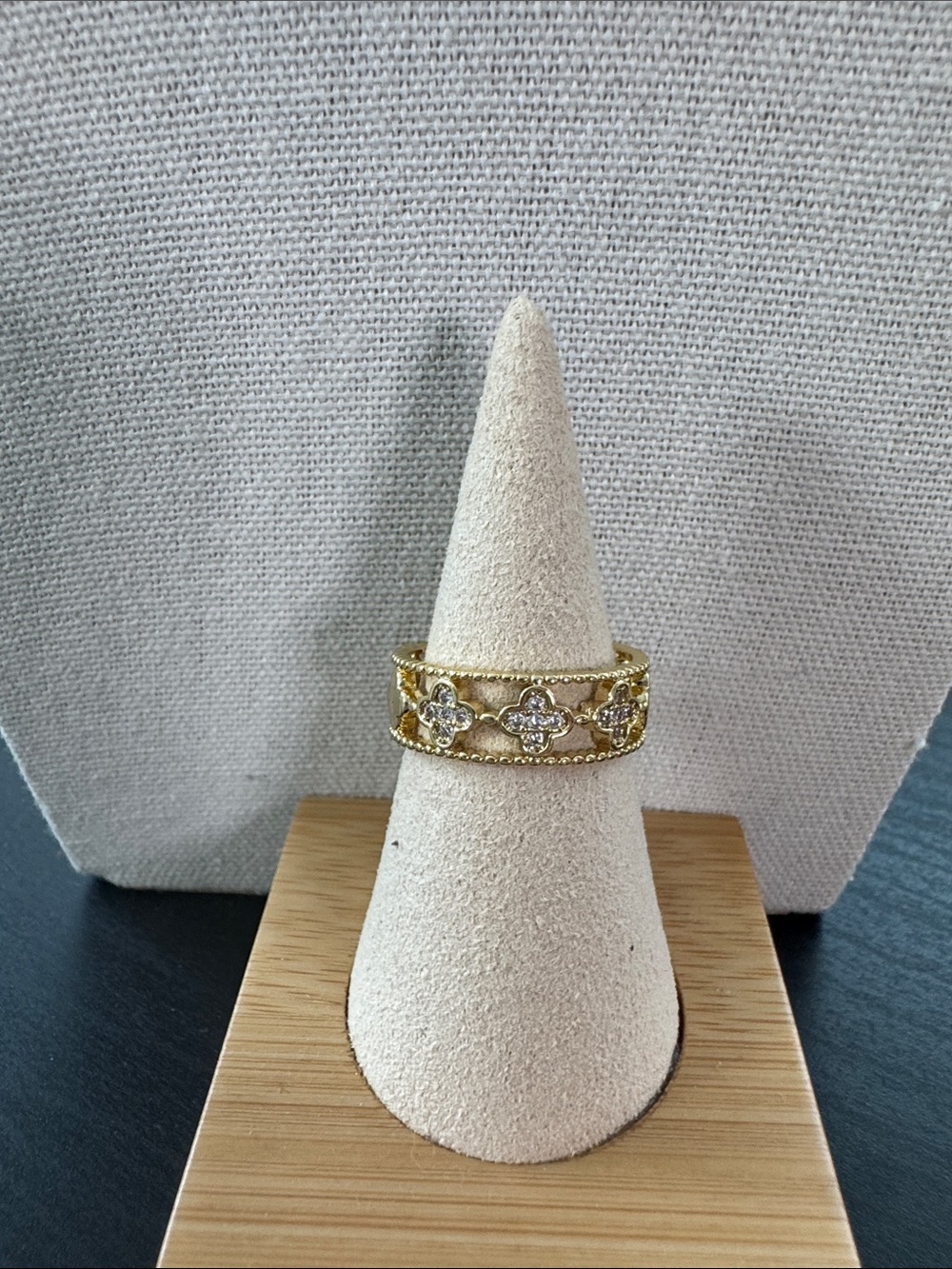 Gold Floral Motif Band Ring with Clear Stones